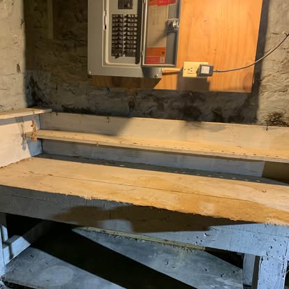 Cleared basement workbench after Haul Hogs hauled off the clutter